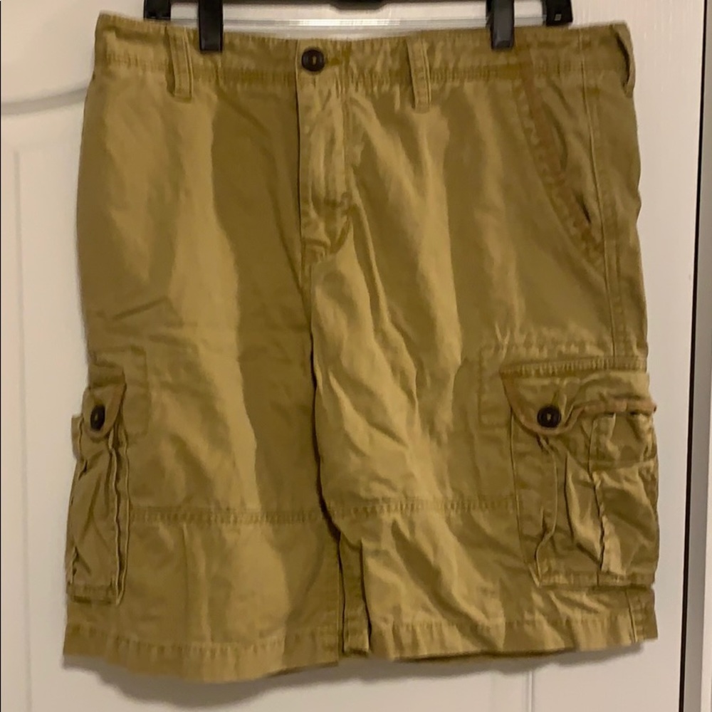 Men’s tan cargo shorts. Size 34.